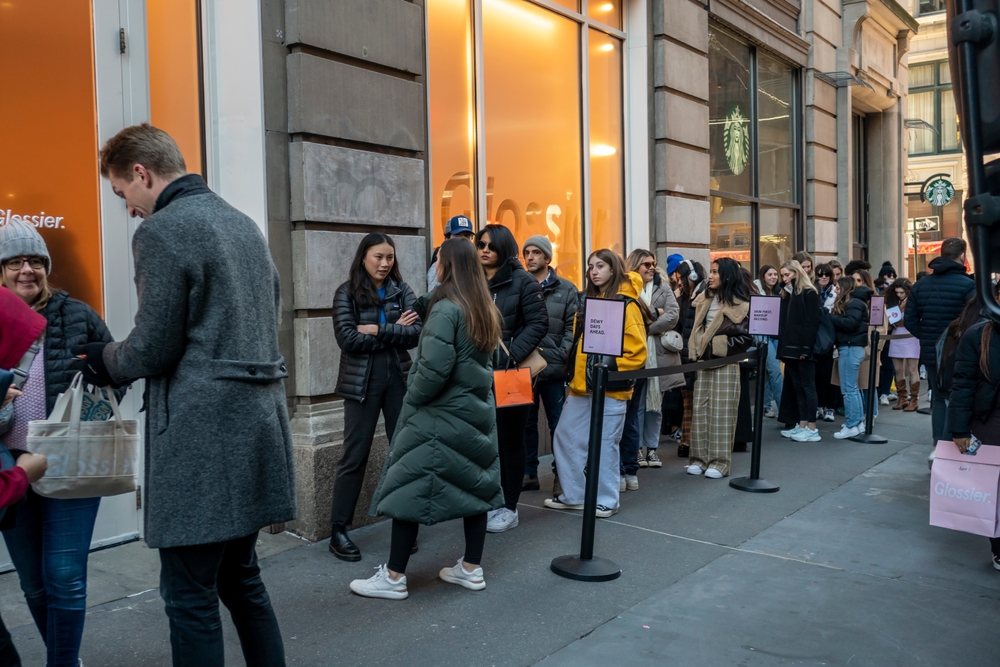 wait to enter the Glossier brick-and-mortar store in Soho in New York