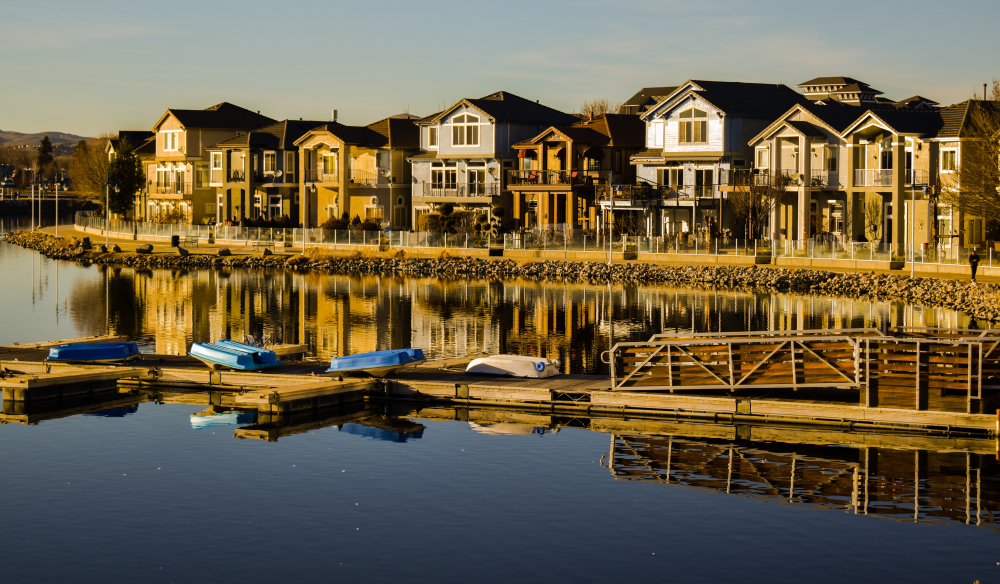 Amazing reflective view of marina in Sparks, Nevada. Beautiful brightly colored homes and dock.