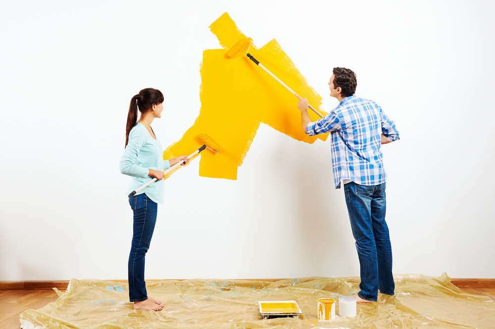 renovation diy paint couple in new home painting wall