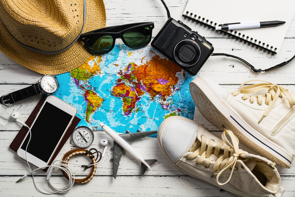 Overhead view of Traveler's accessories, Essential vacation items, Travel concept background