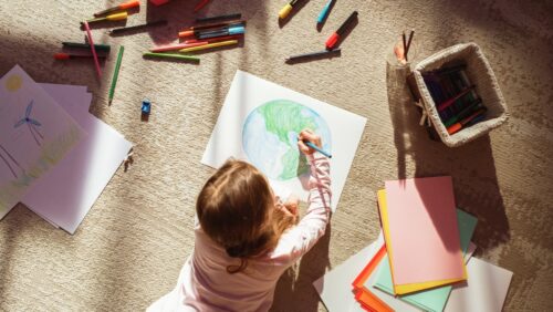 Girl drawing Earth