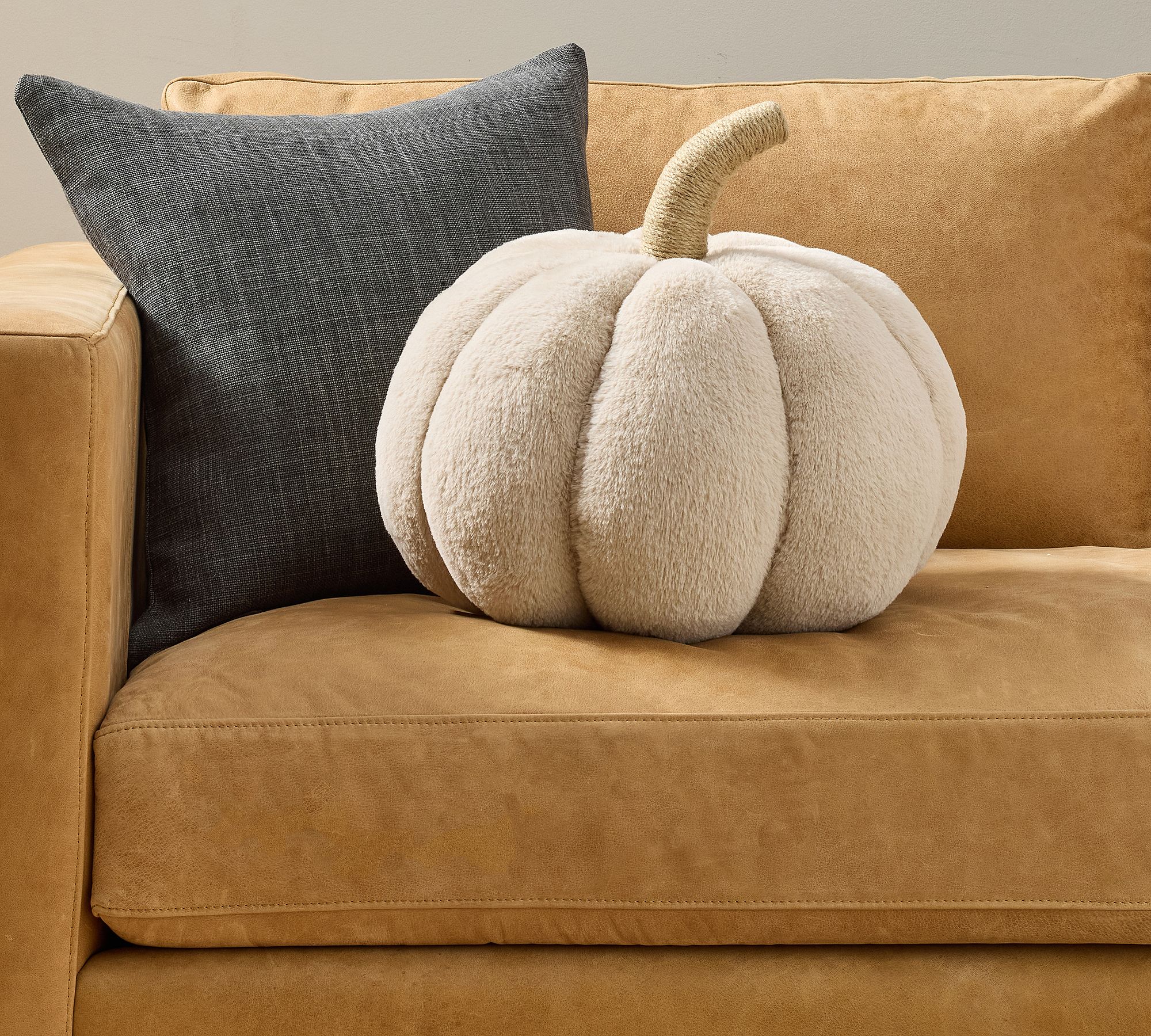 faux fur pumpkin shaped pillow