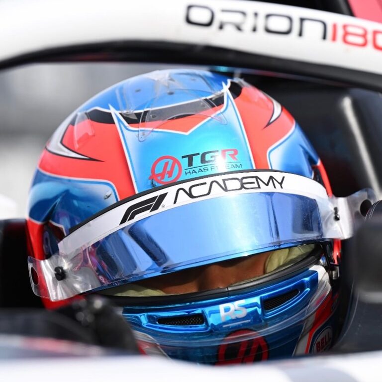 Kaylee Countryman F1 Academy helmet in Haas race car cockpit